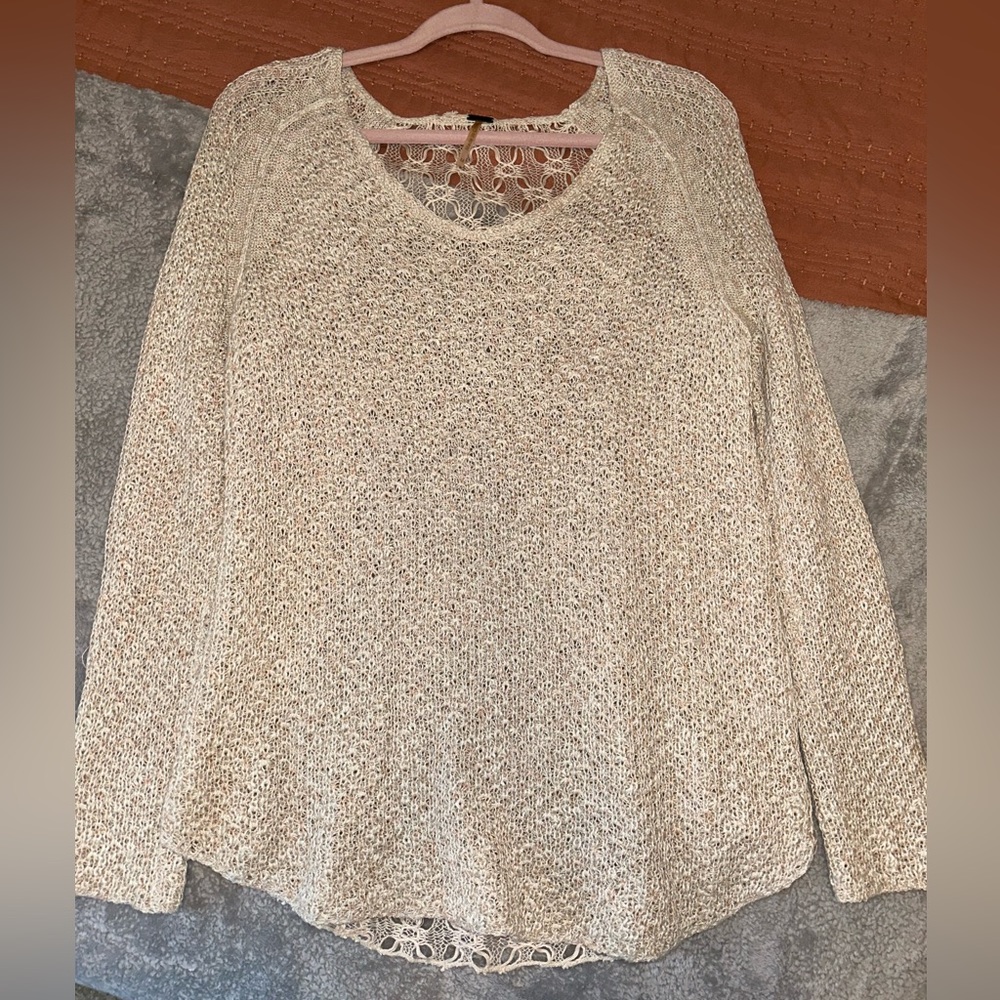 Beige Sweater with Peach Undertones
